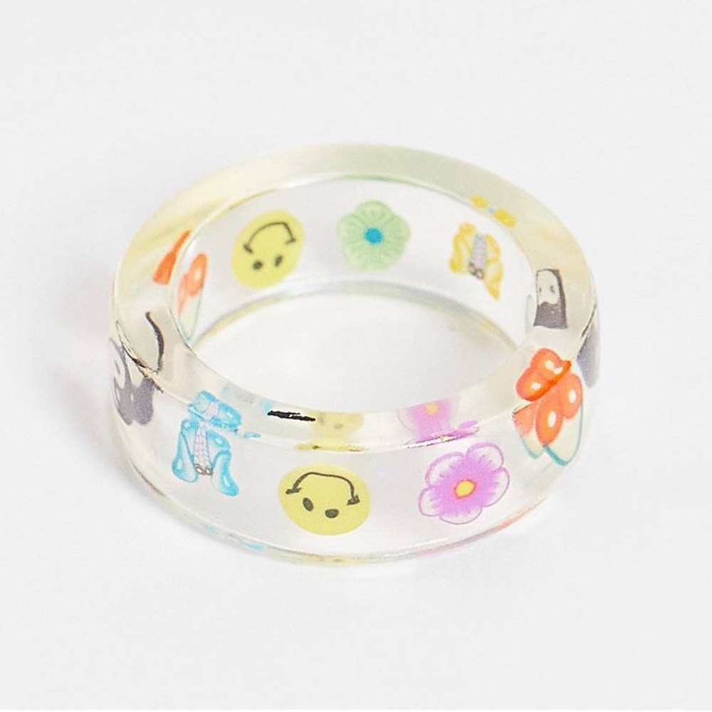 ASOS DESIGN Curve plastic ring with trapped kitsch charms in clear